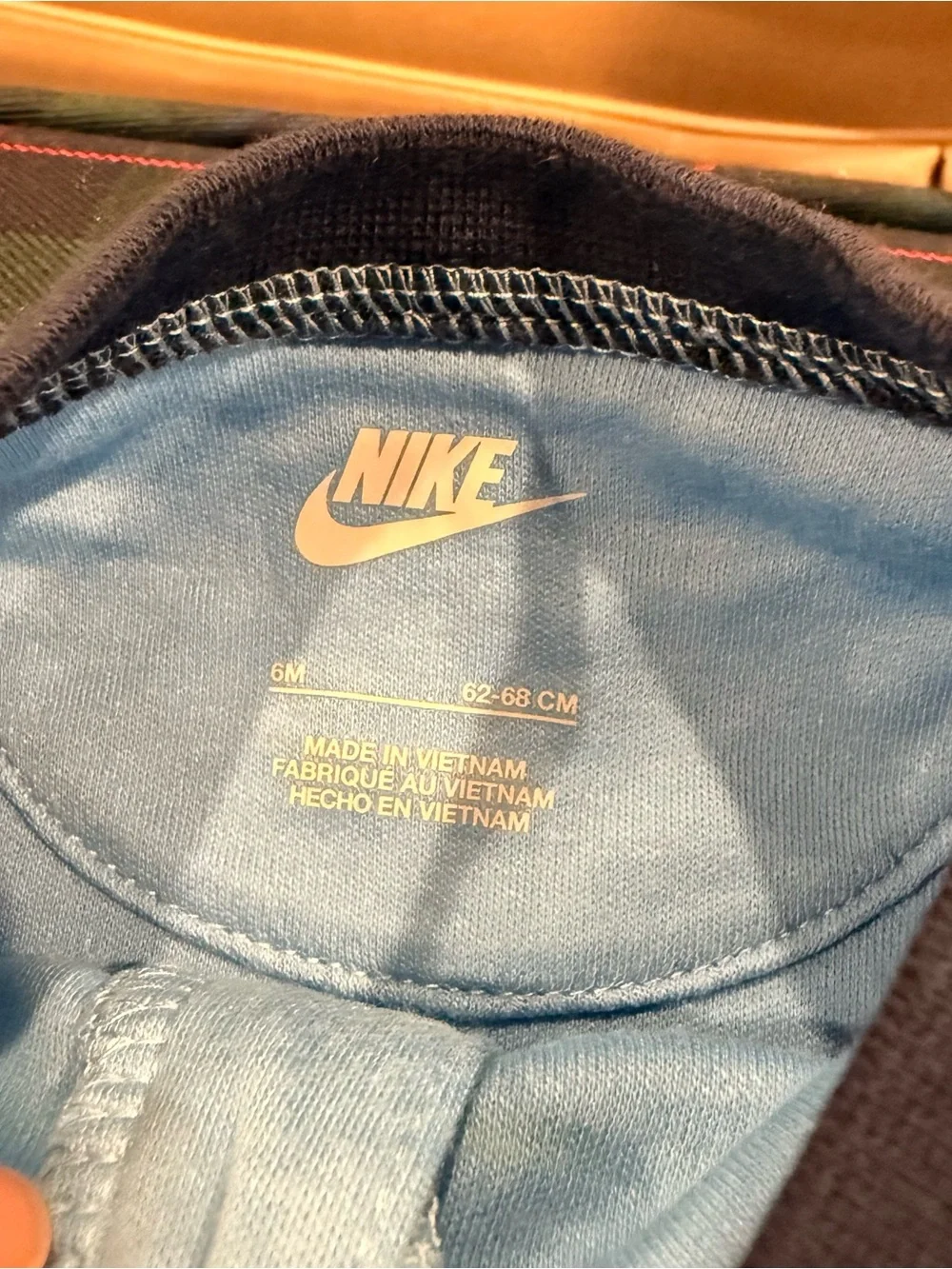 NWT Nike Blue Striped Baby Onesie